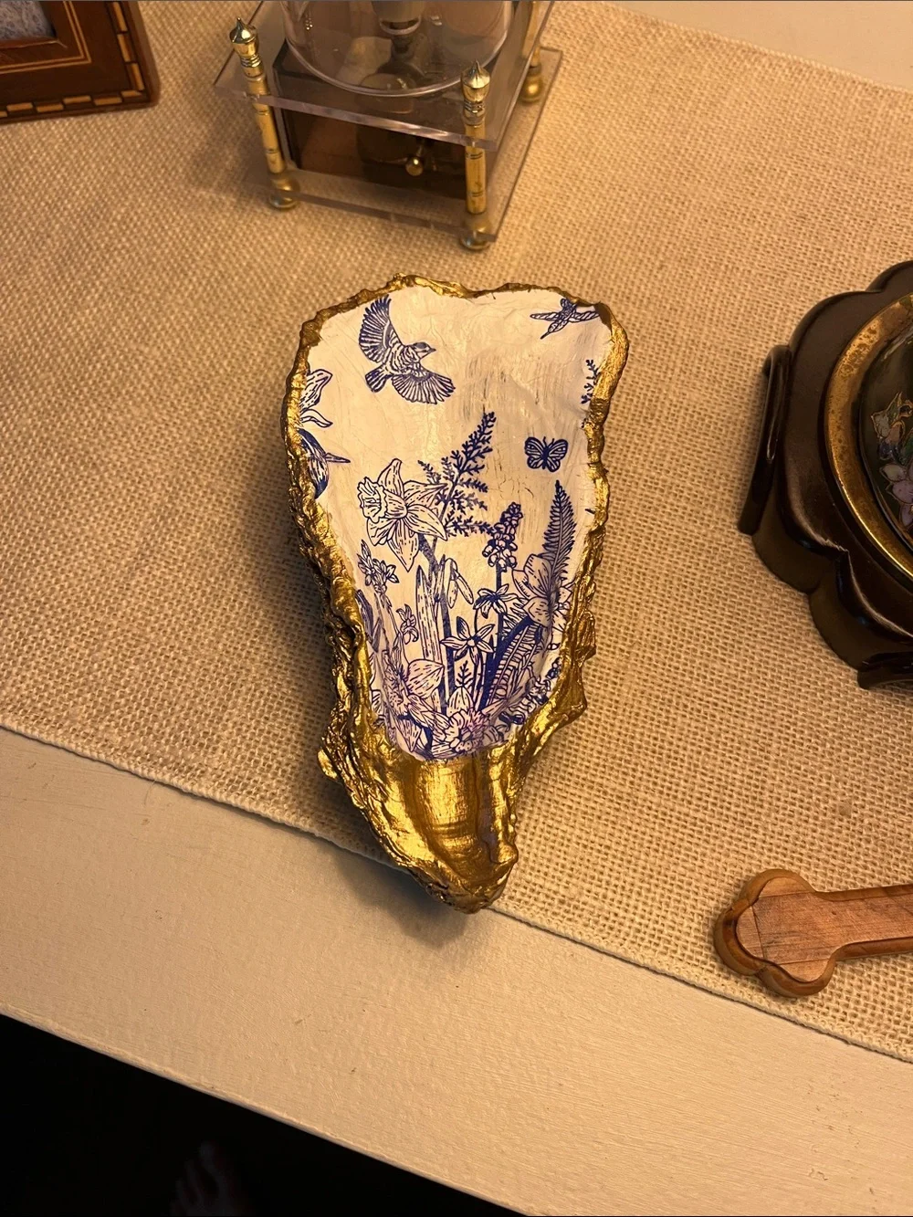 Gold decoupage oyster shell